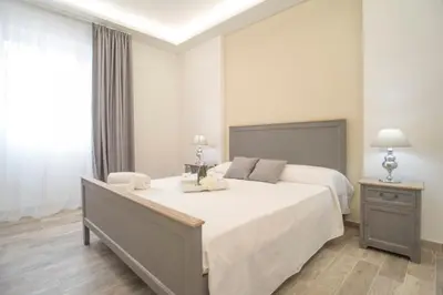 Letto o letti in una camera di Casa Solmes Rooms
