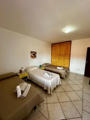 Letto o letti in una camera di Amazing Suite Olbia