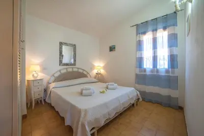 Letto o letti in una camera di villa lilly