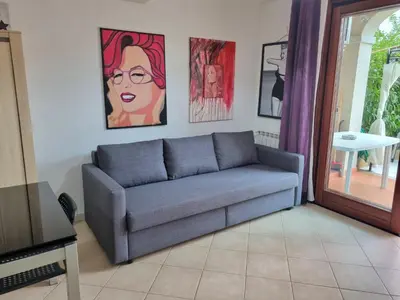 Area soggiorno di ValeValeHome - home gallery with fully equipped kitchen, reserved parking, big garden