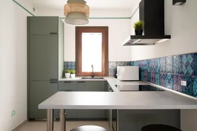 Cucina o angolo cottura di Spiaggia Bianca Pedra Rosa - Your House in Sardinia
