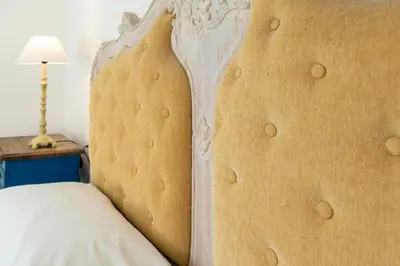 Letto o letti in una camera di Helios Hotel