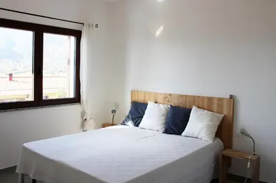 Letto o letti in una camera di Residenze Branca I SeaView