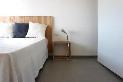 Letto o letti in una camera di Residenze Branca I SeaView