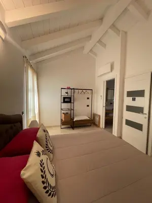 Letto o letti in una camera di Corso Umberto Rooms