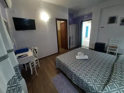 Letto o letti in una camera di Borgo Rurale Cares