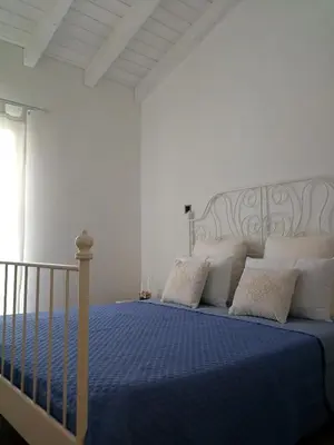 Letto o letti in una camera di La Residenza Di Mario