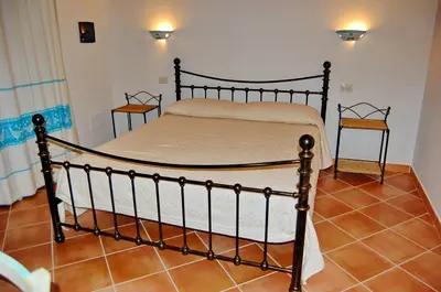 Letto o letti in una camera di Li Teggi Turismo Rurale