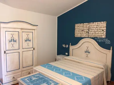 Letto o letti in una camera di Oasi Muru Idda