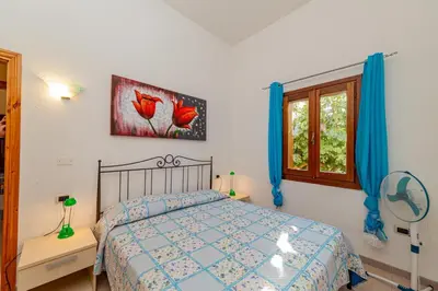 Letto o letti in una camera di Centro Residenziale Le Canne