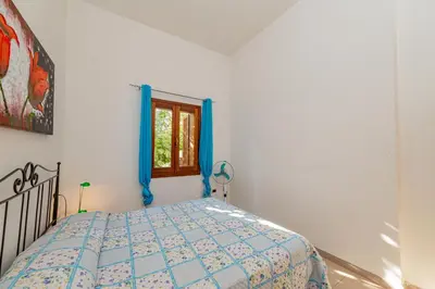 Letto o letti in una camera di Centro Residenziale Le Canne