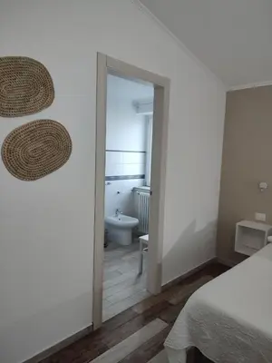 Letto o letti in una camera di B&B Fradama' Holiday