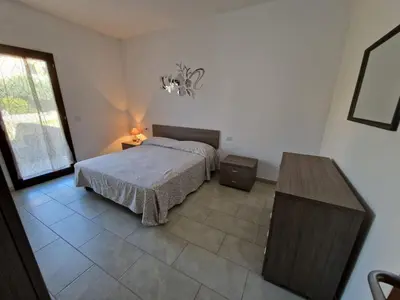 Letto o letti in una camera di Domo de Mare