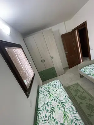 Letto o letti in una camera di Domo de Mare