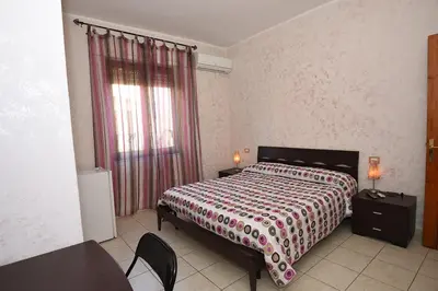 Letto o letti in una camera di Sa Marina