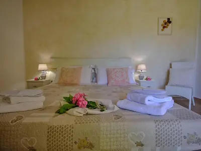 Letto o letti in una camera di Tenute Murales