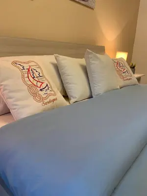 Letto o letti in una camera di La Marina Apartment with Pool