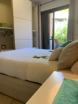 Letto o letti in una camera di La Marina Apartment with Pool