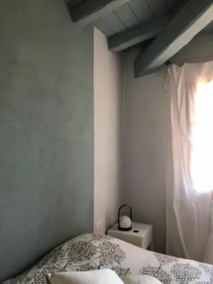 Letto o letti in una camera di Casa Giumagio