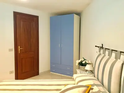 Letto o letti in una camera di Villa vista mare con piscina