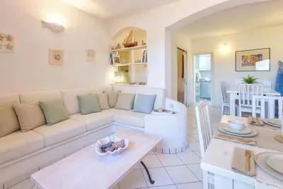 Area soggiorno di Costa Corallina Villa with direct beach access and stunning views