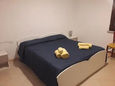 Letto o letti in una camera di Le rondini