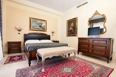 Letto o letti in una camera di Grand Hotel President