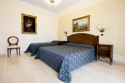 Letto o letti in una camera di Grand Hotel President