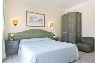 Letto o letti in una camera di Hotel Maria Rosaria