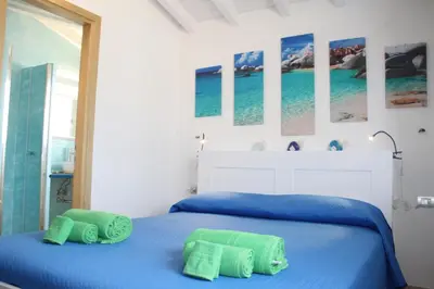 Letto o letti in una camera di R House Budoni