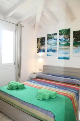 Letto o letti in una camera di R House Budoni