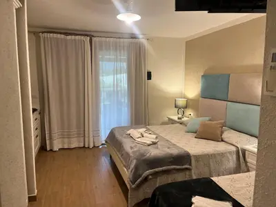 Letto o letti in una camera di Il Giardino di Daniela Apartments