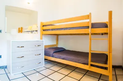 Letto o letti in una camera di Casa Vacanze Rosa Maria