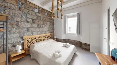 Letto o letti in una camera di Residenze Civitas