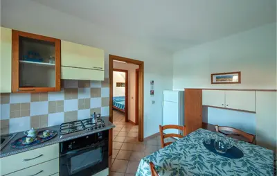 Cucina o angolo cottura di Amazing Apartment In San Teodoro Ot