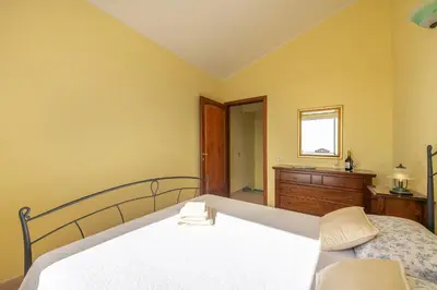 Letto o letti in una camera di AffittaSardegna-Villino Panna