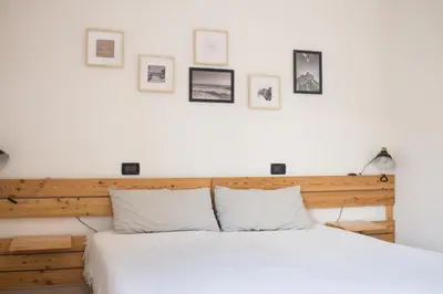 Letto o letti in una camera di Residenze Branca III SeaView