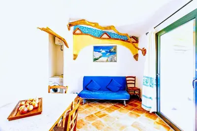 Letto o letti in una camera di Orosei RE - Il Paradiso degli Ulivi con PISCINA e vista mare