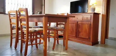 TV o dispositivi per l'intrattenimento presso La Solidea - Villa con giardino a pochi passi da Cala Ginepro