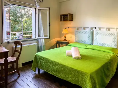 Letto o letti in una camera di La Terrazza Guesthouse