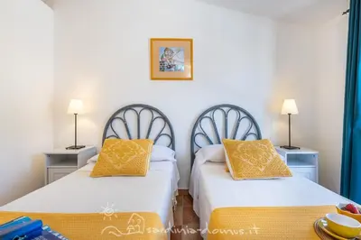 Letto o letti in una camera di CASA CON VISTA MARE