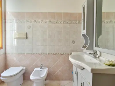 Bagno di Le Domosolas - Appartamenti in centro storico a Orosei
