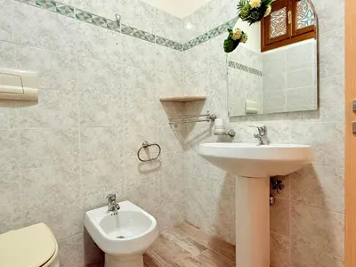 Bagno di Le Domosolas - Appartamenti in centro storico a Orosei