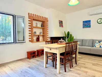 Area soggiorno di Le Domosolas - Appartamenti in centro storico a Orosei
