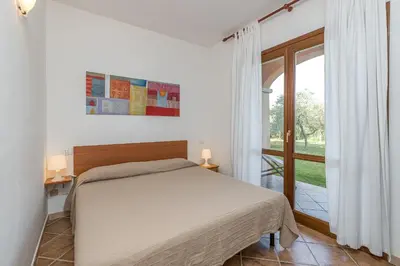 Letto o letti in una camera di Le Dimore di Nettuno