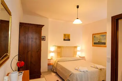 Letto o letti in una camera di Appartamento a San Teodoro