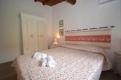 Letto o letti in una camera di Appartamento Maestrale