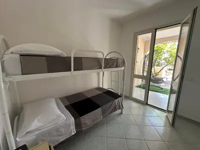 Letto o letti in una camera di Casa Cioppy
