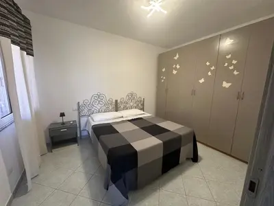 Letto o letti in una camera di Casa Cioppy