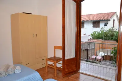 Balcone o terrazza di Confortevole appartamento a pochi passi dal mare